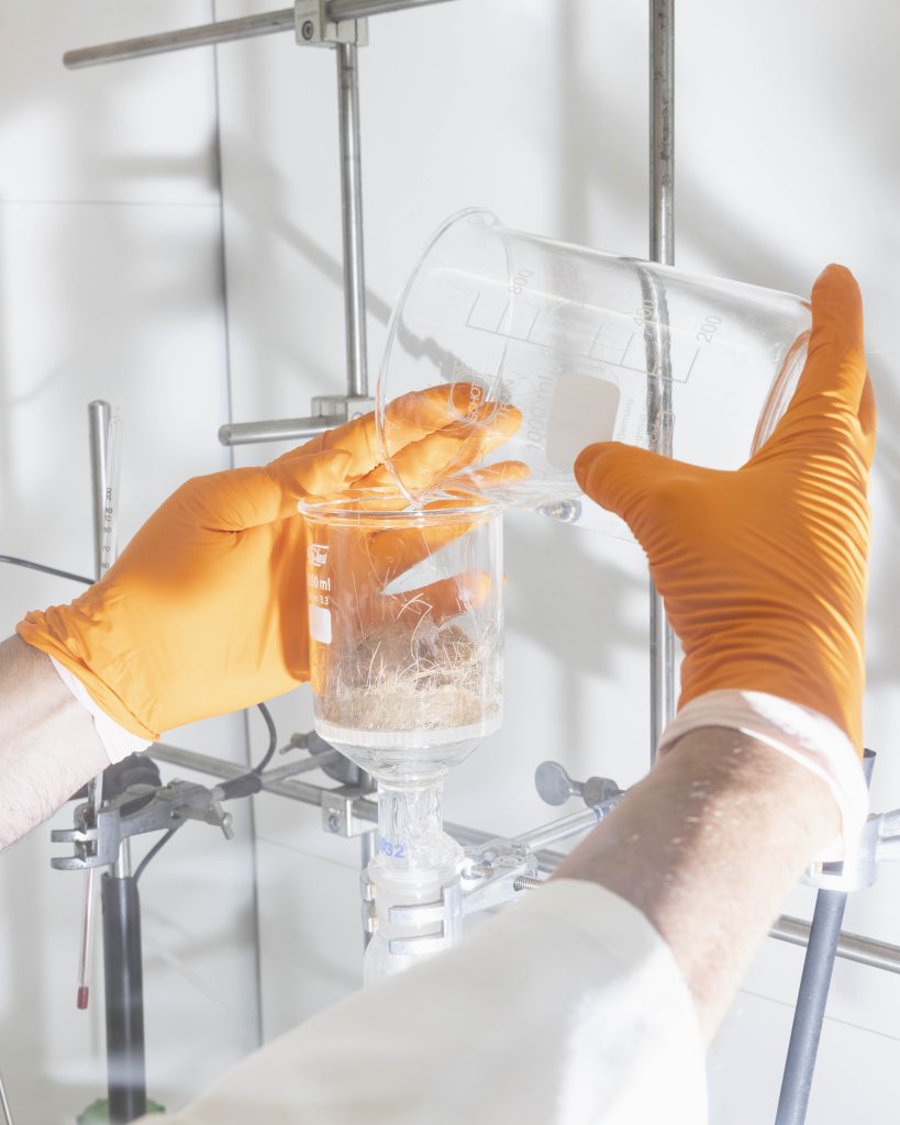 Processing human hair into fiber in the lab