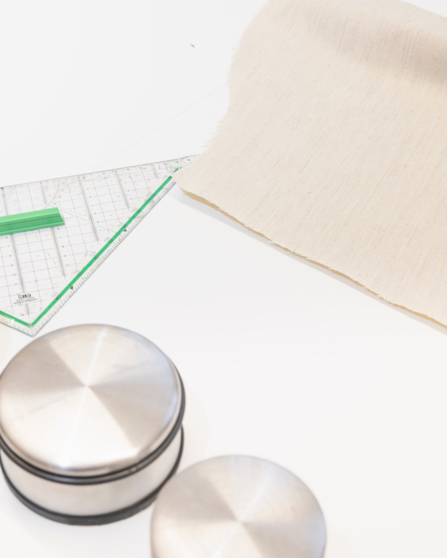 Textile samples and measuring tools in the studio