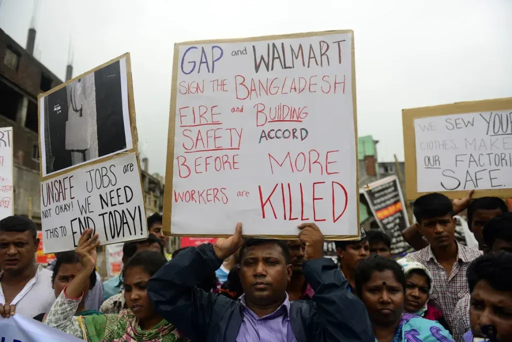 Garment workers protest for factory safety in Bangladesh after the Rana Plaza collapse.