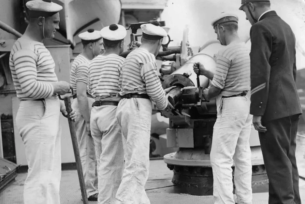 French navy sailors wearing striped marinière shirts